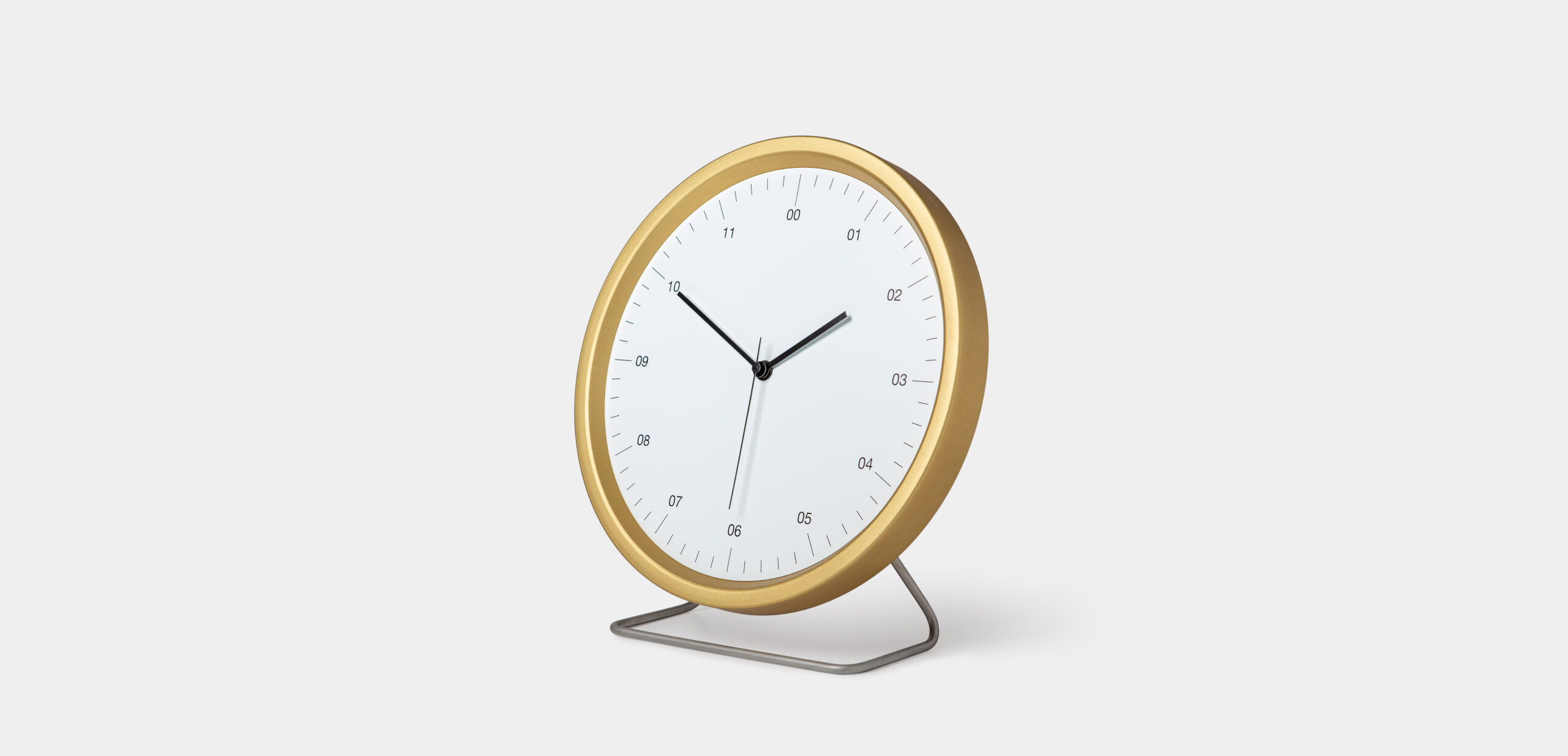 Foto reloj dorado de Instrmnt